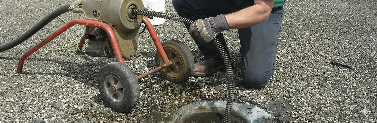 sewer rodding technician actively removing blockages from a sewer line in Boise, ID