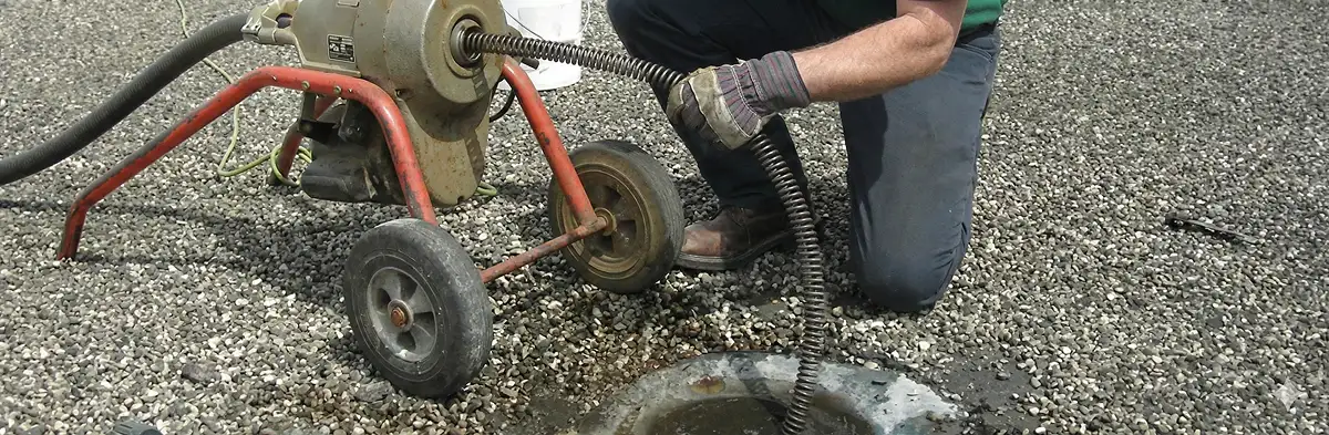 sewer rodding technician actively removing blockages from a sewer line in Boise, ID
