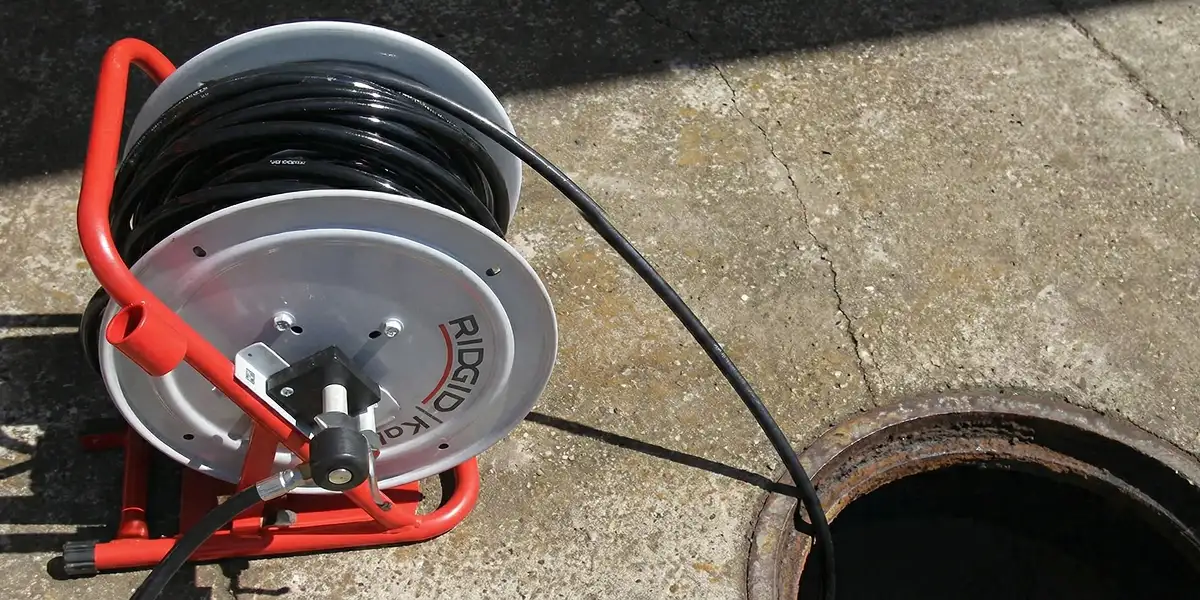sewer rodding equipment prepared to clear clogged sewer lines in Boise, ID